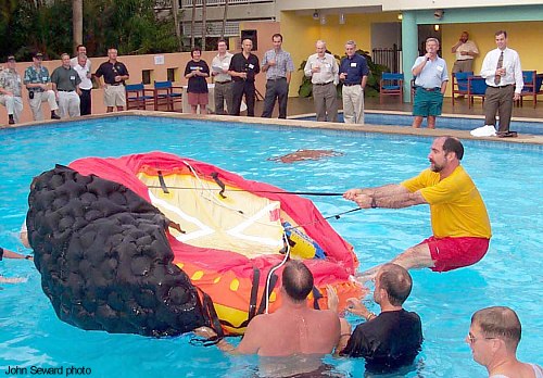 Doug Ritter demonstrates righting the Switlik POD-8 life raft