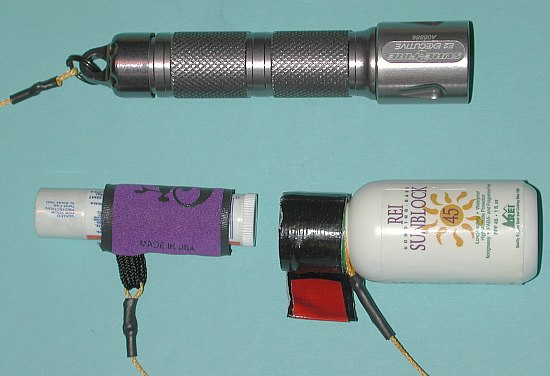 E2 flashlight and sun protection in right, rear pocket